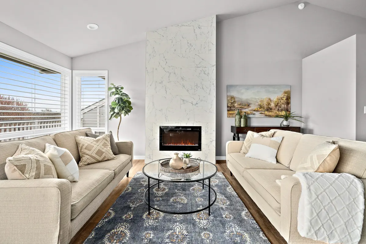 A living room with two couches in a Rogue Valley Manor residence.